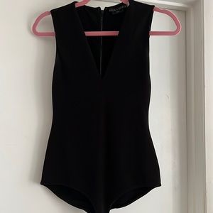 Alice + Olivia deep V bodysuit with exposed back zipper